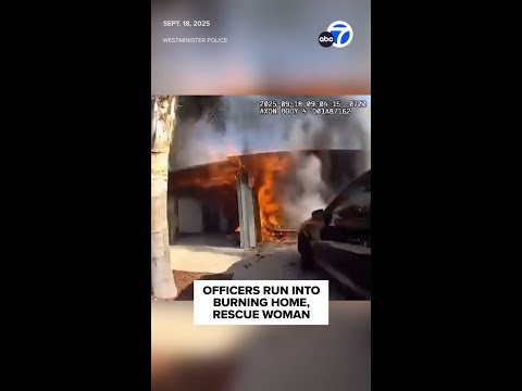 Officers run into burning home, rescue woman