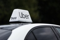 Justice department targets major rideshare service in lawsuit over discrimination