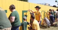 Green Bay Packers fans keep Labor Day fence-painting tradition alive