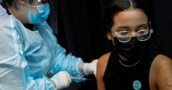 Factbox-Vaccine requirements and exemptions across US