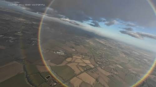Skydivers capture full circle rainbow in magical airborne moment