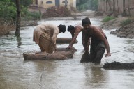 Boat capsizes in Pakistan floods, killing nine, authorities say