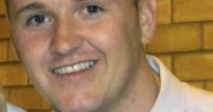 Dad shot in head after opening door to his home
