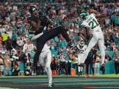 Darren Waller has 2 TDs, Dolphins beat Jets 27-21 but lose Tyreek Hill to serious leg injury