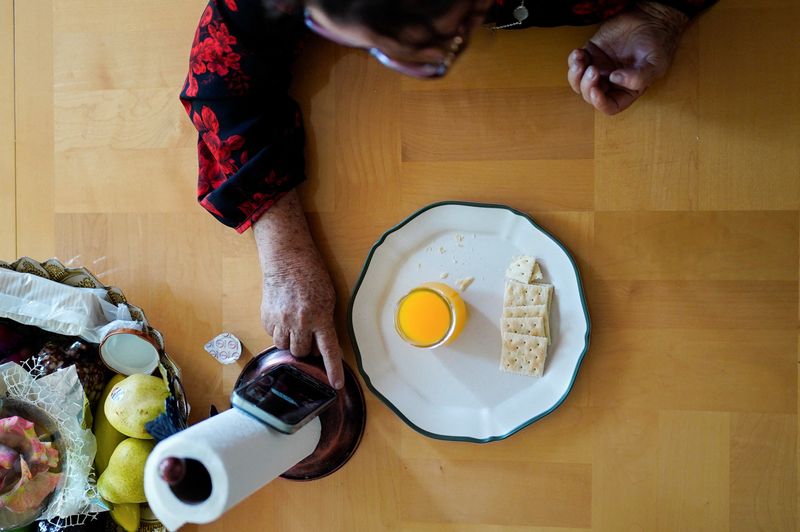 Immigrant faithful turn to virtual sermons, home communion amid Trump crackdown