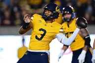 Cal slows Minnesota offense, Sagapolutele throws 3 TDs in win