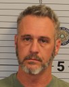 Man arrested at driver services center for threatening mass violence