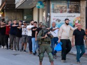 Israel arrests over 100 Palestinians, imposes curfew in West Bank city