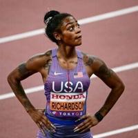 Defending champion Richardson struggles into 100m world final