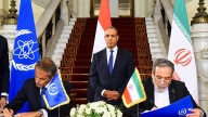 Iran and nuclear watchdog sign agreement seeking path to restart cooperation