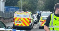 Armed police storm Glasgow street as two people charged and man in hospital
