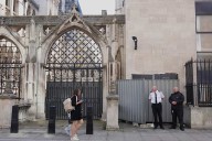 Banksy unveils a new mural of a judge beating a protester outside London court