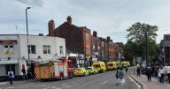 Police swarm Manchester restaurant as 'several diners taken ill after eating food'