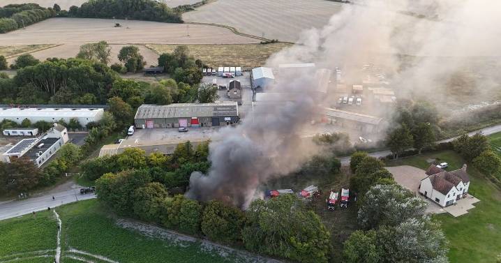 Firefighters rush to large aircraft hangar blaze in Cambridgeshire village