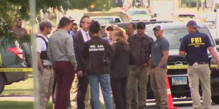 ICE officer fatally shoots suspect after being dragged by car near Chicago, officials say