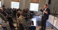 Sen. Warner speaks to local education leaders about federal cuts, future of AI