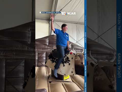 Dan and Emily tackle the mechanical bull at Big E