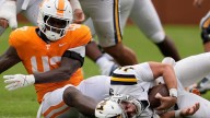 Aguilar throws for 288 yards, 2 TDs to lead No. 22 Tennessee past East Tennessee, 72