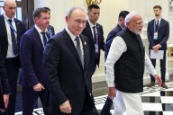 Smiles and clasped hands as Xi, Putin and Modi try to signal unity
