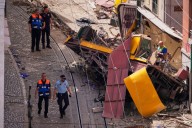 Portuguese investigators search for cause of Lisbon streetcar crash that killed 16