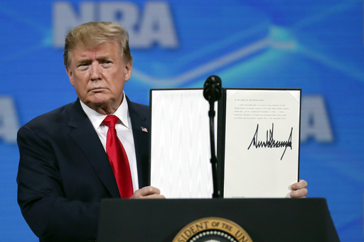 The Latest: Judge allows Cook to remain as Fed governor while Trump tries to fire her