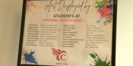Students showcasing artwork at Ottumwa Regional Health Center