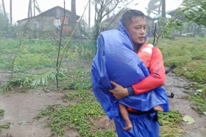 Super typhoon blowing by northern Philippines and Taiwan forces evacuations and closures