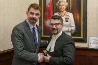 Trade cartoon-like quotes for inspirational messaging, NDP advises municipal affairs minister