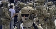 Commentary: Federal authorities deserve to do their jobs safely. It starts with removing the masks
