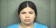 Woman charged after toddler rescued from hot car in KCK parking lot