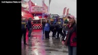 Man intervenes in fight at fair, wrestles gun from brawler