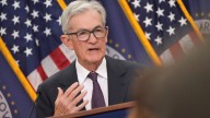 Powell signals Federal Reserve to move slowly on interest rate cuts