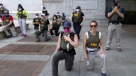 FBI fires agents photographed kneeling during 2020 racial justice protest, AP sources say