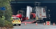 'Utter chaos' on M60 after lorry hits bridge causing major delays