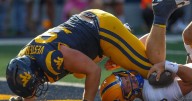 PHOTOS: West Virginia completes comeback, beats Pitt in overtime to win Backyard Brawl