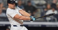 Yankees beat White Sox 5-3 behind Stanton and Rodón to stay tied with Toronto for AL East lead