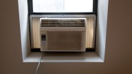 The Curtain Trend That Covers A Window Ac Without Sacrificing Natural Lighting