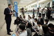 South Korean workers return home after days of detention in Georgia following immigration raid