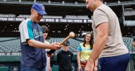 Mariners’ Cal Raleigh meets mystery fan who caught No. 60 (and then gave it away)