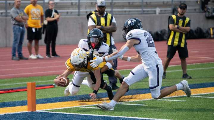 Pueblo East and Discovery Canyon battle it out on a wet, electric night