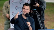 Far-right activists are pressuring employers to fire Charlie Kirk critics