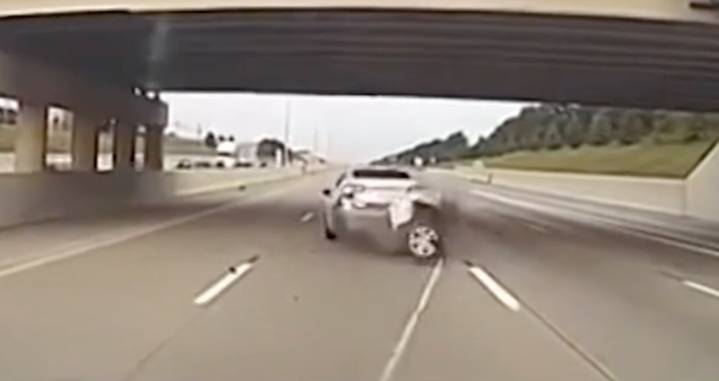 WATCH: Police Grappler Tears Axle Off Stolen Car to End Highway Pursuit