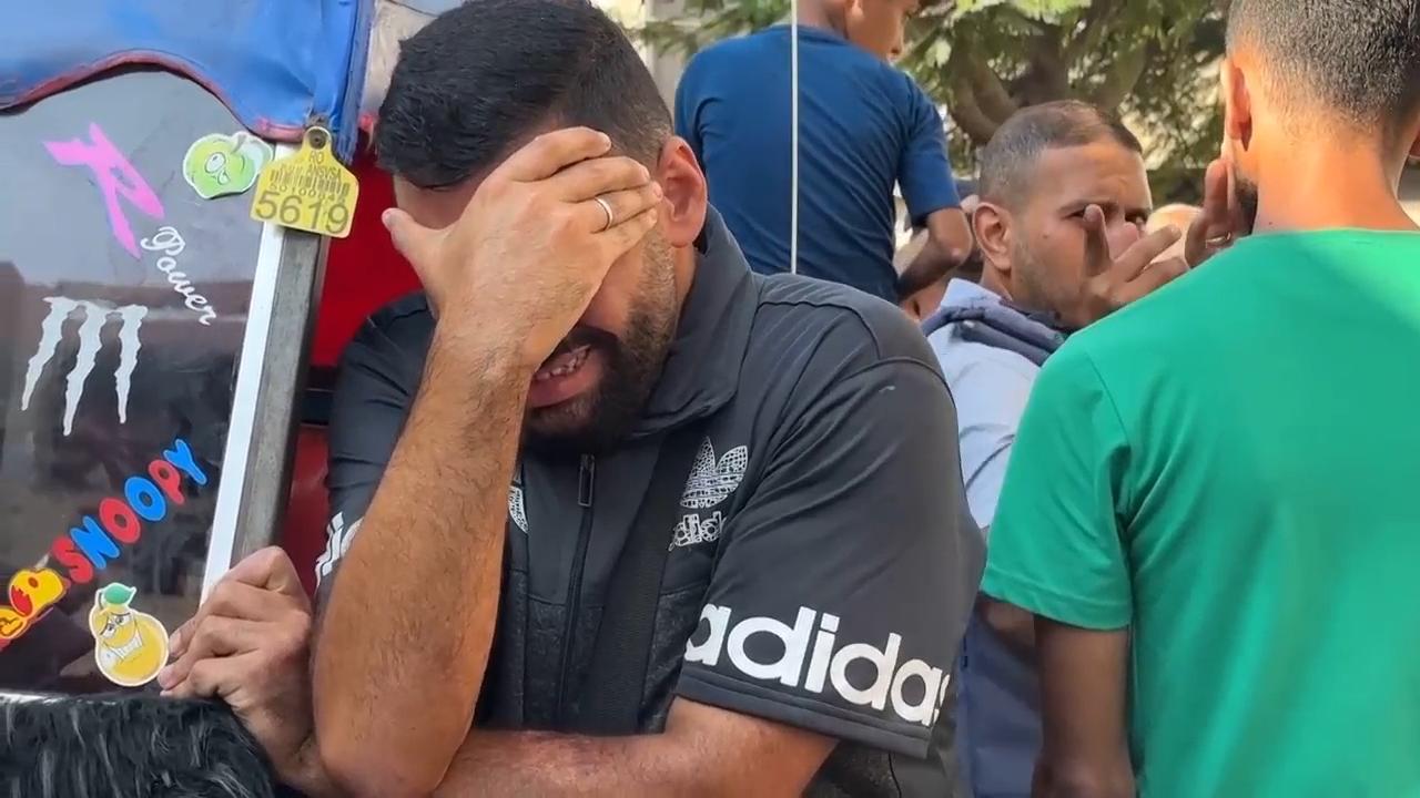 Mourners gather at Gaza City morgue after more than 40 people killed overnight