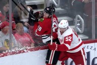 After two seasons with Griffins, defenseman joins Swedish club