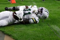 Jayden Reed exits early with shoulder injury in Packers worry