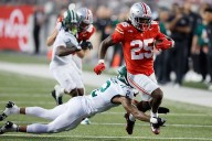 Sayin passes for 3 touchdowns, top-ranked Ohio State pulls away in second half to defeat Ohio 37