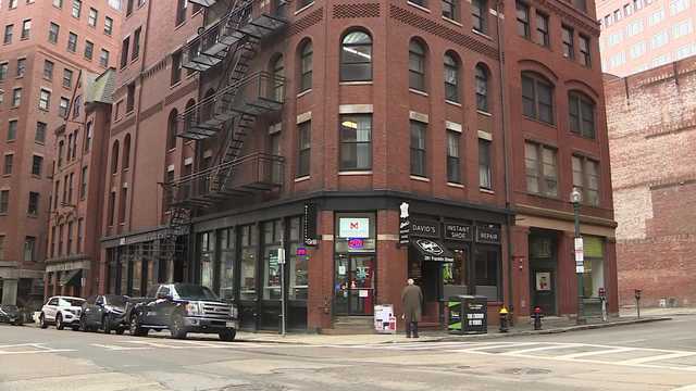 Residents moving into Boston's first office-to-apartment conversion project