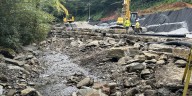 Work continues to haul away landslide debris, build retaining wall on Newfound Gap Road in Great Smoky Mountains