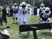 Ravens place defensive tackles Madubuike, Washington on injured reserve