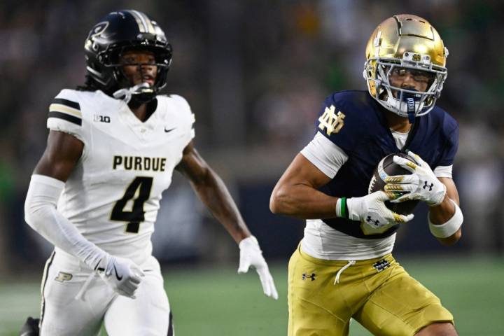 Price's four touchdowns power No. 24 Notre Dame to 56